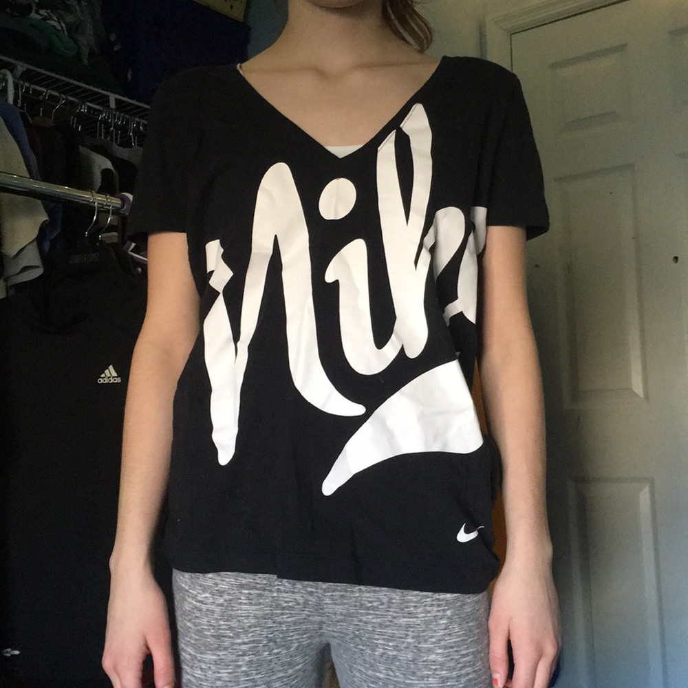 Black and white Nike shirt.